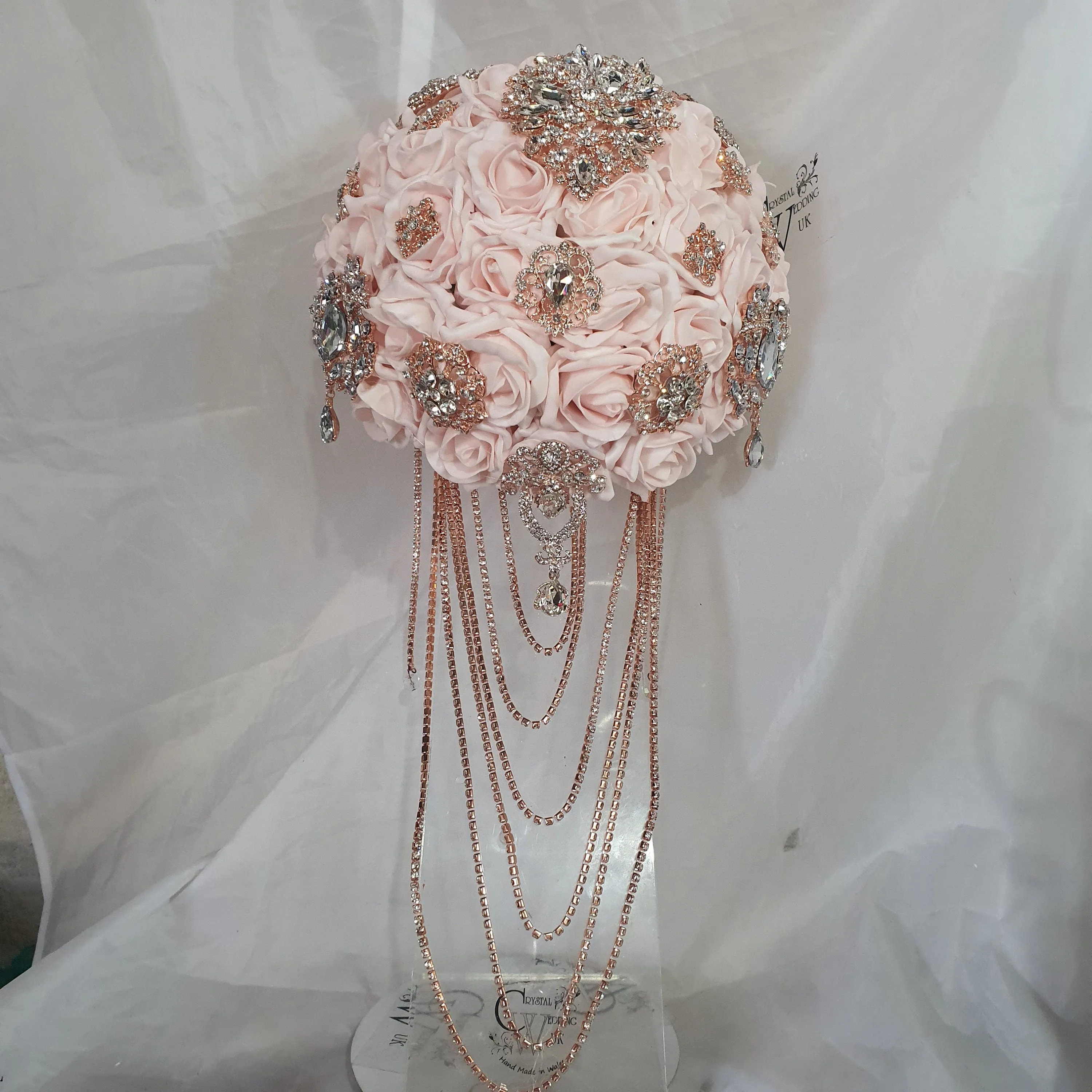 Crystal Brooch blush and rose gold drape  bouquet by Crystal wedding uk